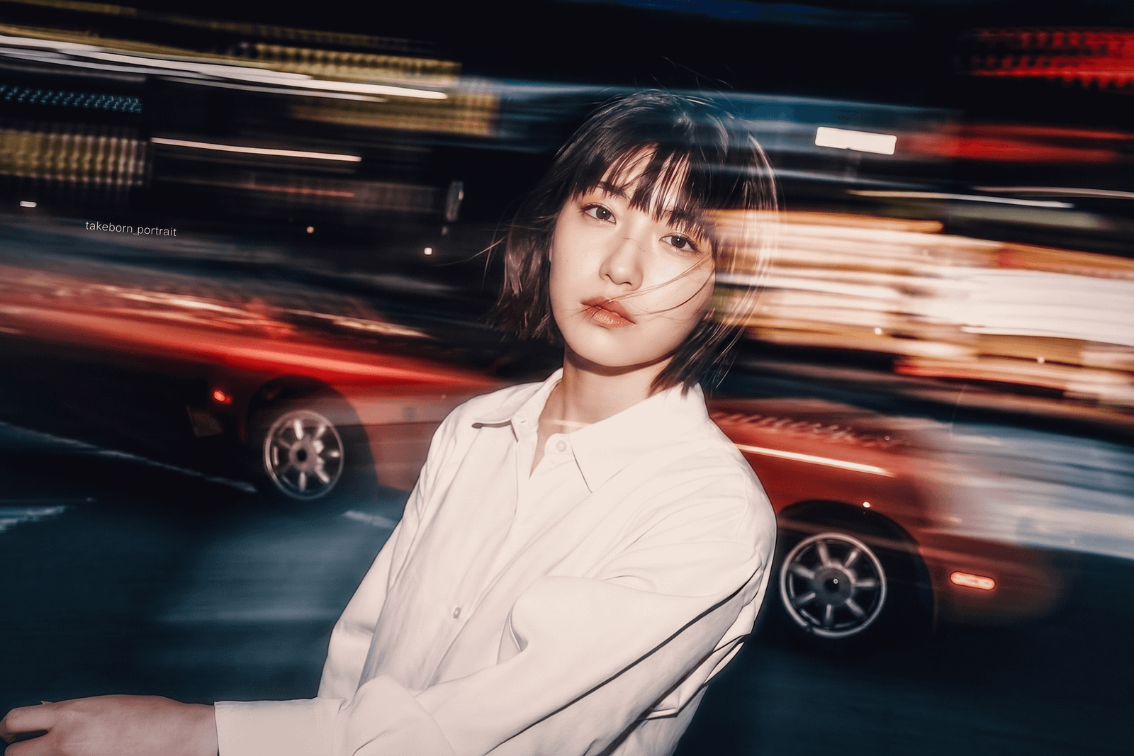 A portrait among city lights